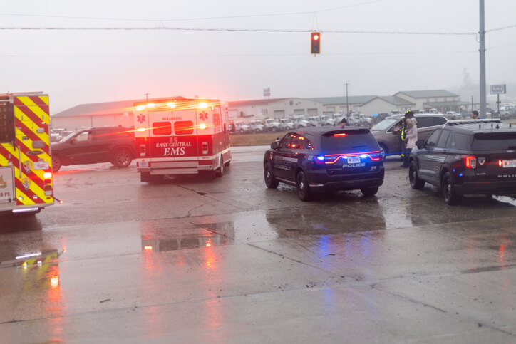 Emergency responders at an accident scene in Deming, emphasizing the need for an attorney.